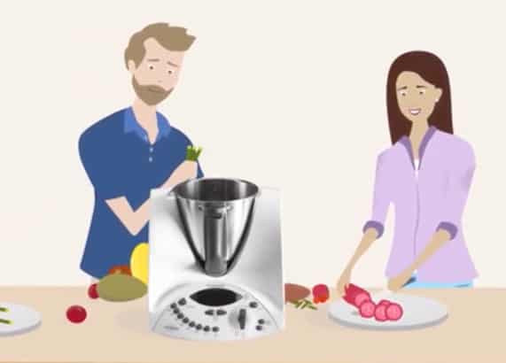Couple cooking using Thermomix