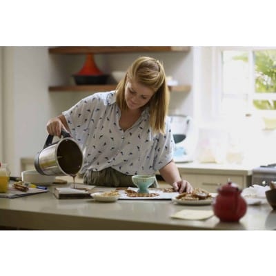 Woman cooking using Thermomix